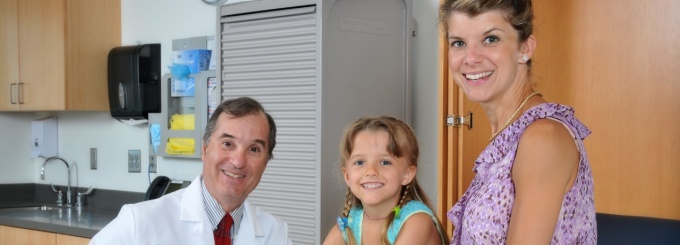 Dr. Milling and patient family.