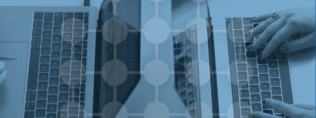 Image of two laptops with the UBMD logo on it.