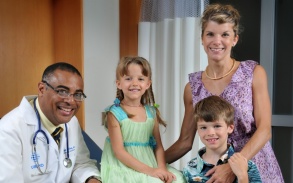 Dr. Milling with a family.