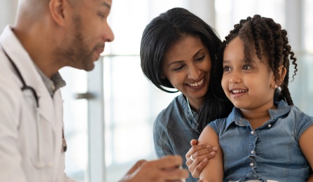 Experienced Family Medicine physician providing an annual physical check up with mother and child. Top pediatric care in Amherst, NY. Top primary care offices Tonawanda, NY. Top family medicine office in Buffalo, NY.